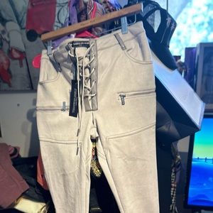 Boutique pants say size large burn fit small